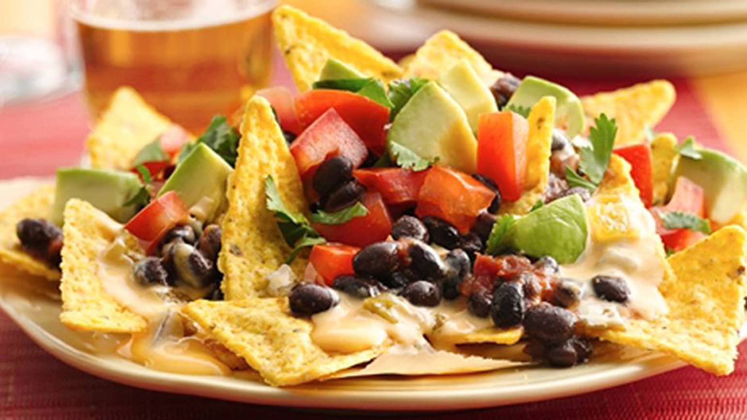 cheesy bean and sweet corn nachos